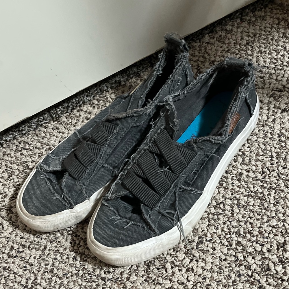 Women’s gray ripped (meant to be) shoes